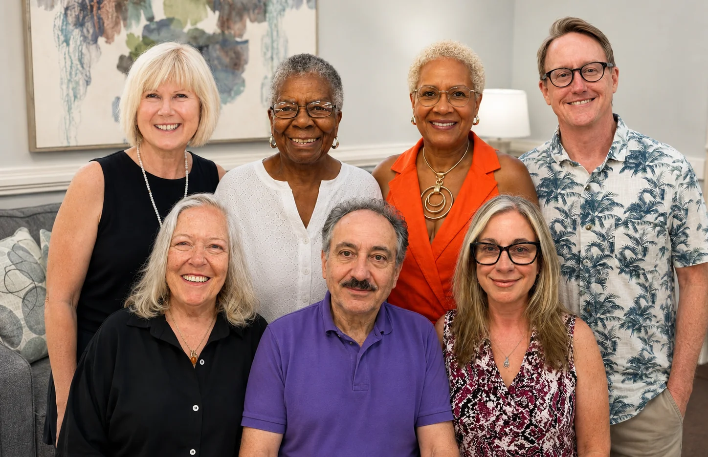 The seven members of the Unity of Raleigh Board of Directors, together in two rows in a sitting room